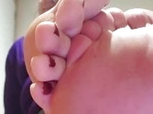 Foot Closeups While On Break At Work