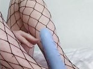 footjob with my dildo, while wearing fishnet stockings